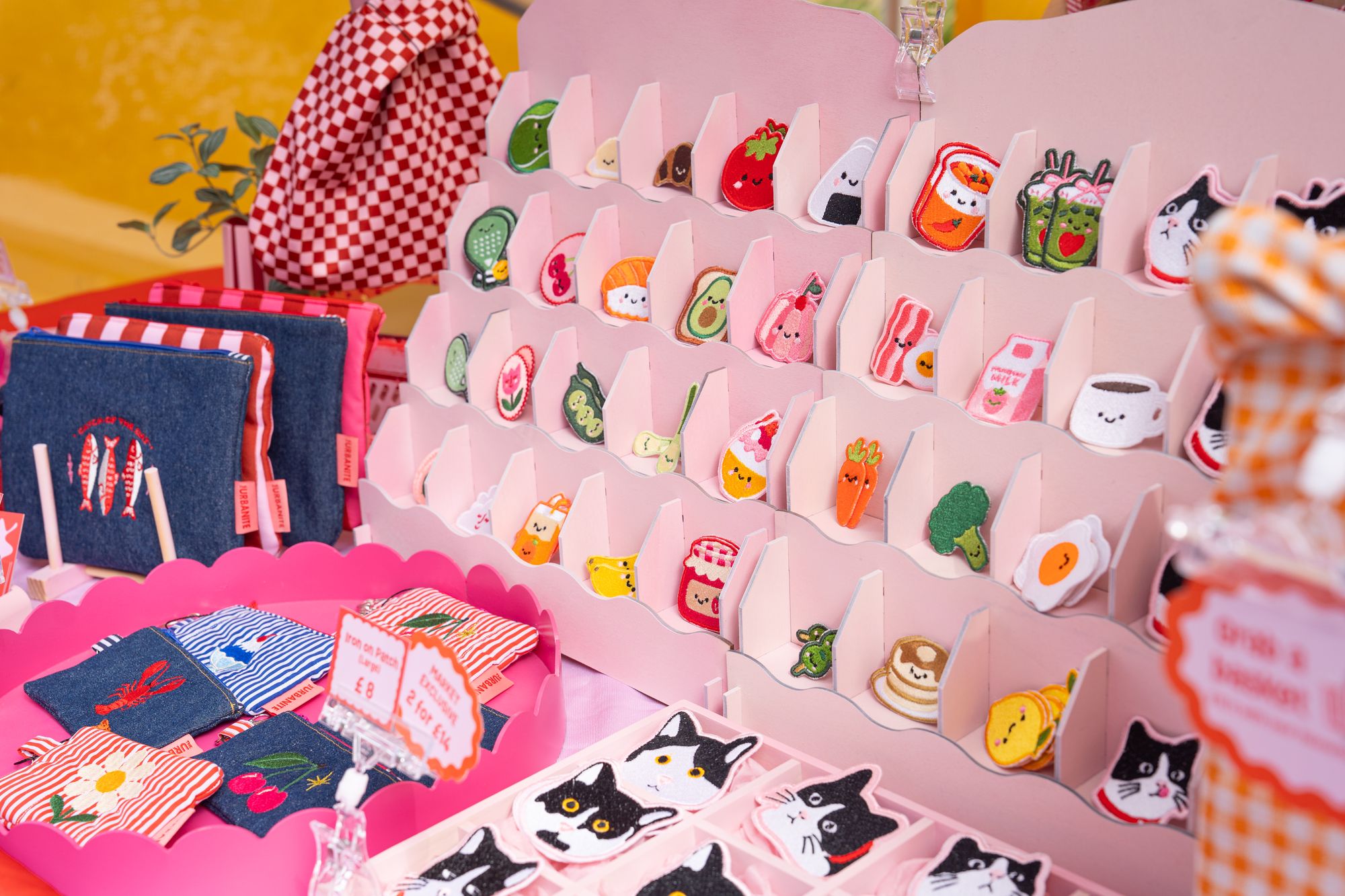 A colourful display of enamel pins at the Craft & Flea market during Round the Dock.