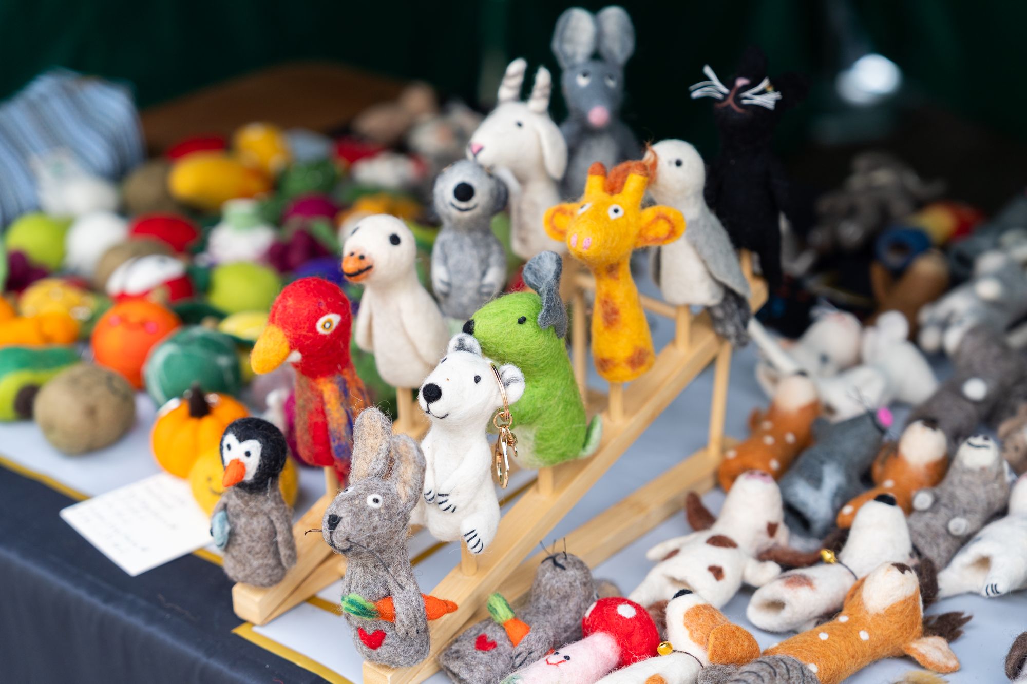 Handmade felt animals on a Craft & Flea market stall — product photography at Canada Water.