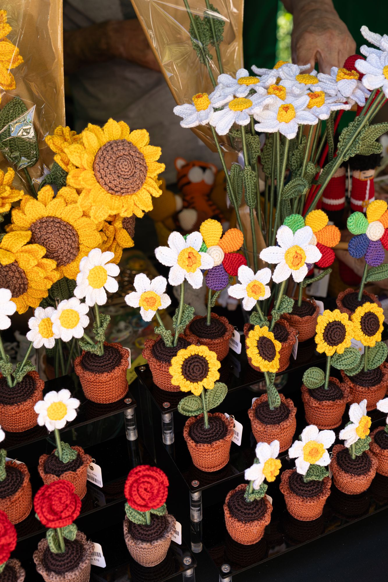 Handmade felt sunflowers and daisies in pots at the Craft & Flea market, Canada Water.