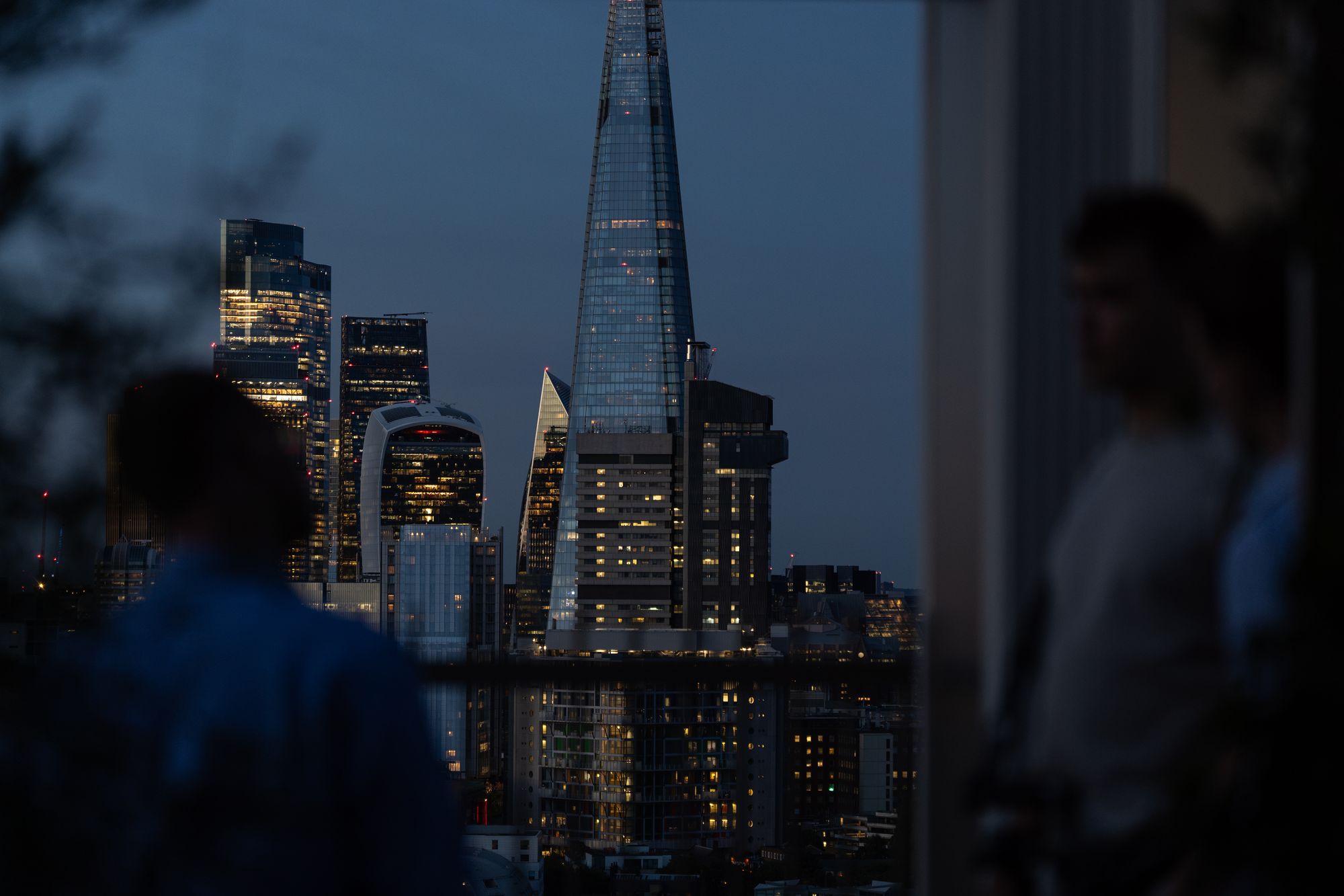 The Shard and City skyline at dusk from the Arbour Heights launch — the evening closing over central London.