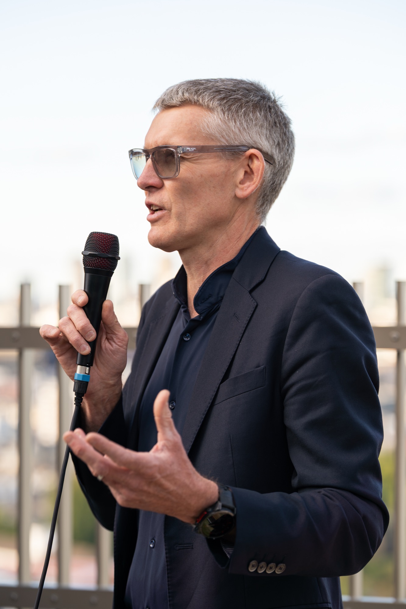 Portrait of a speaker addressing guests at the Arbour Heights launch, The Wilderly, Elephant Park.