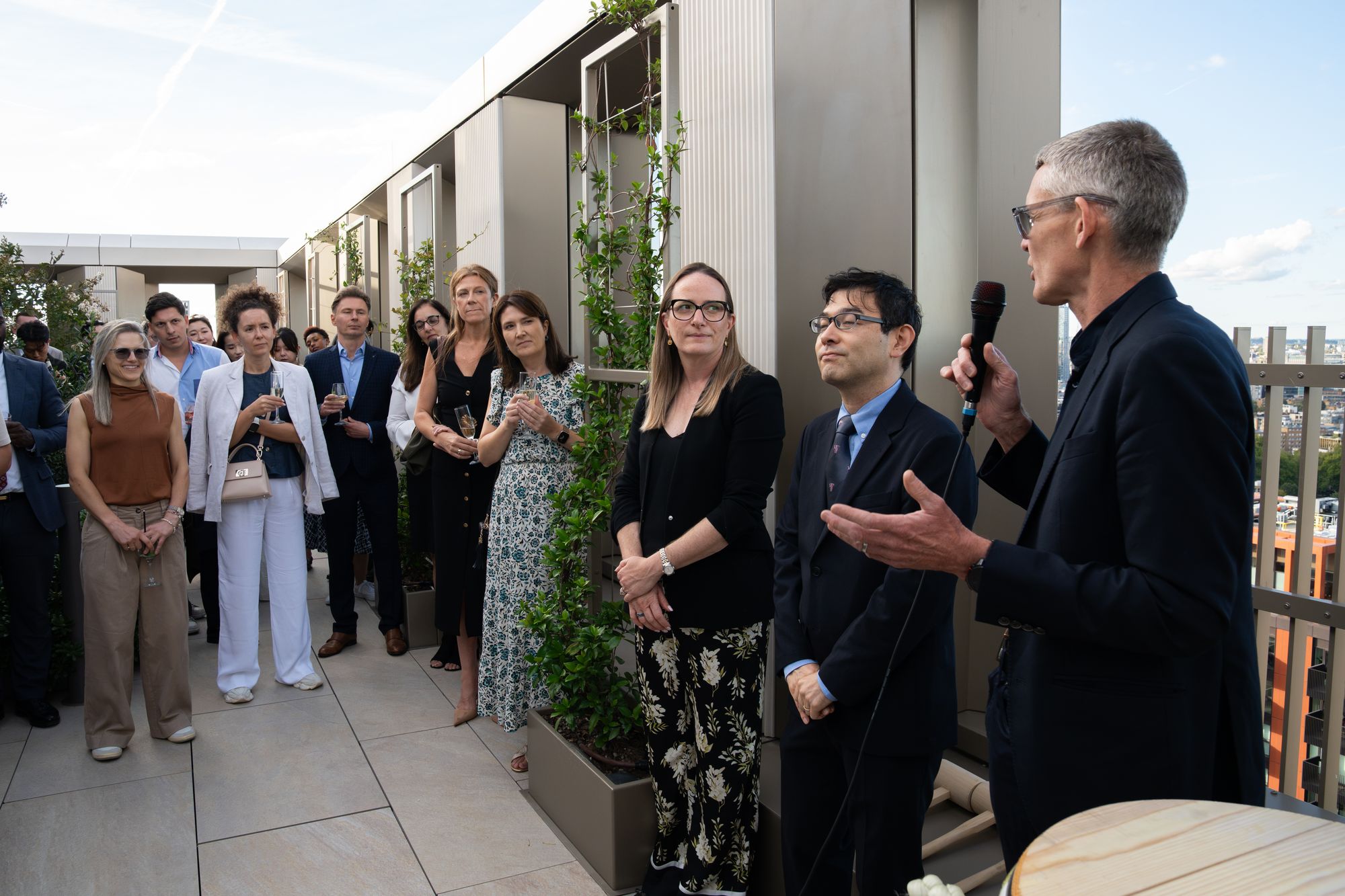 Speeches on the roof terrace at the Arbour Heights residential launch — event photography for Lendlease in London SE17.