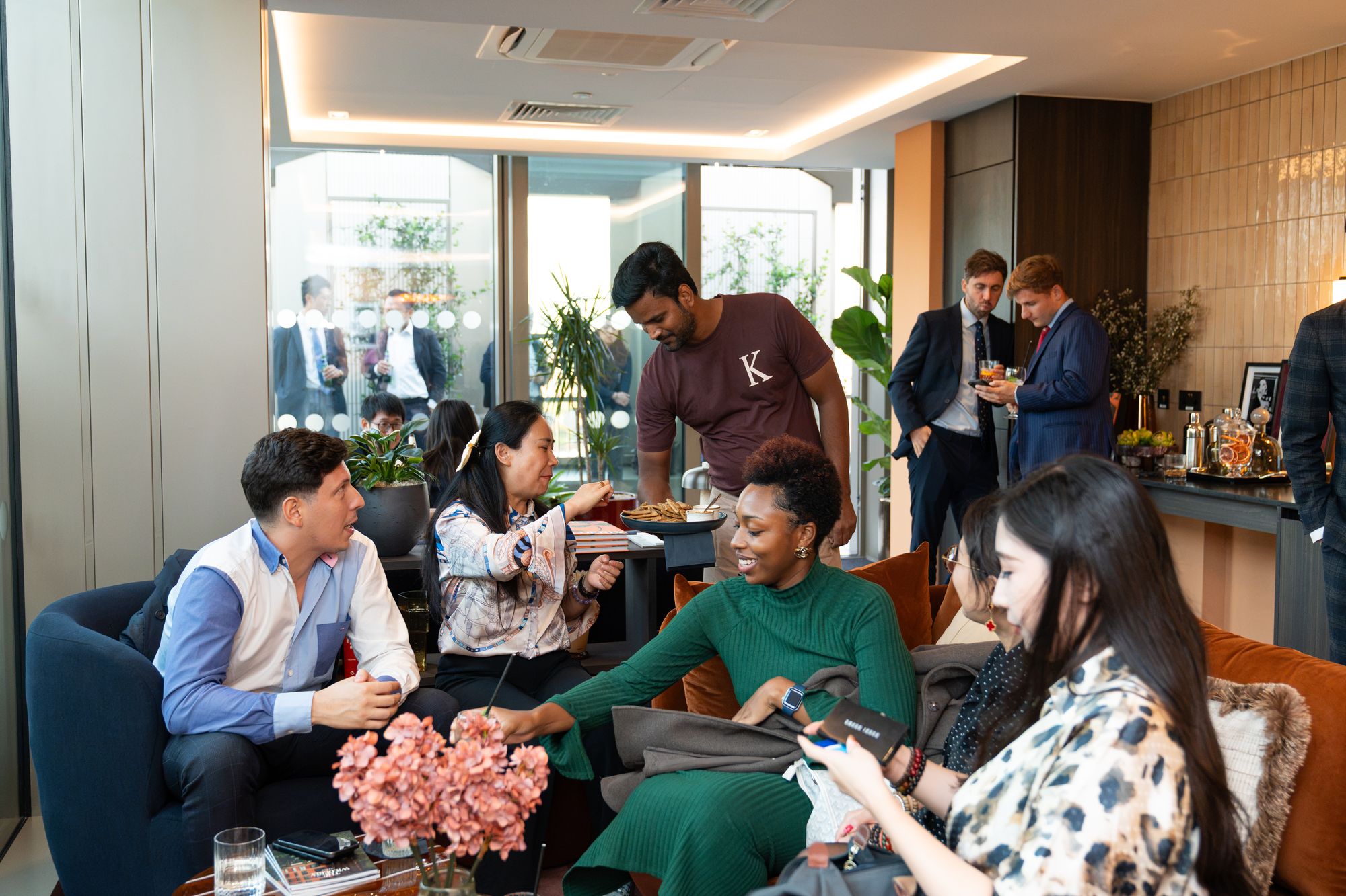 Guests relaxing in the residents' lounge interior at Arbour Heights, The Wilderly — interior and guest experience photography for Lendlease.
