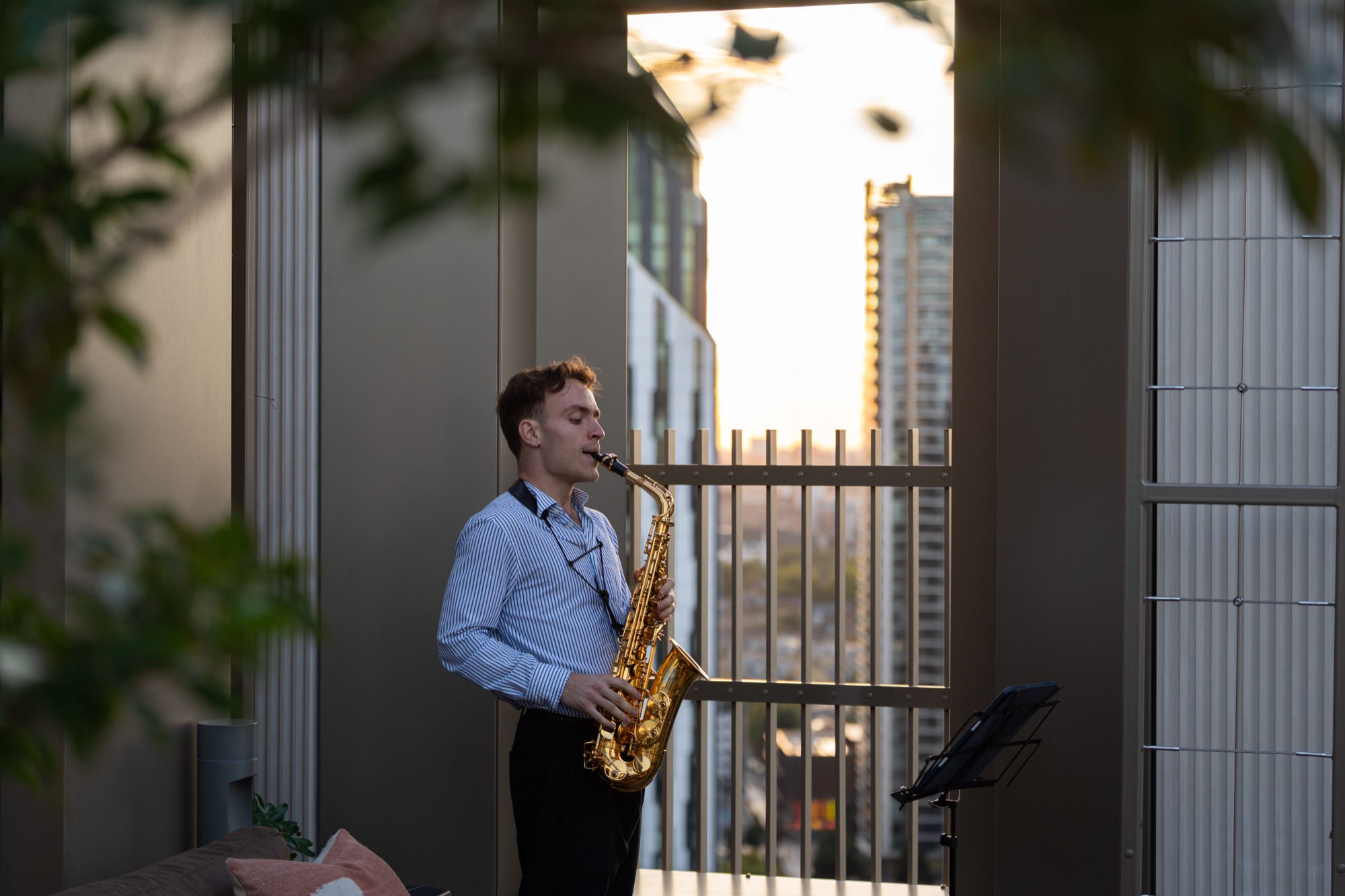 Live saxophone on the Arbour Heights roof terrace during the launch evening at Elephant Park.
