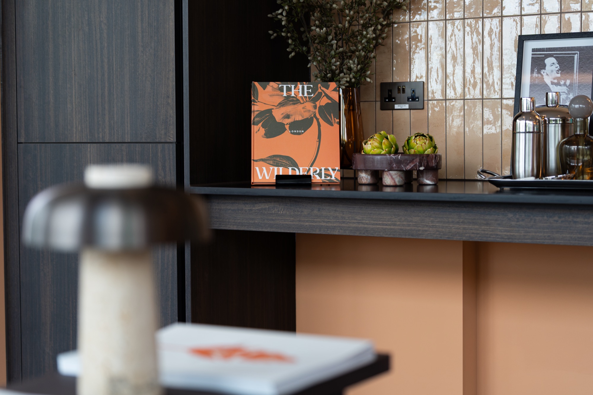 Interior styling detail with The Wilderly book on display at Arbour Heights, Elephant Park, London.