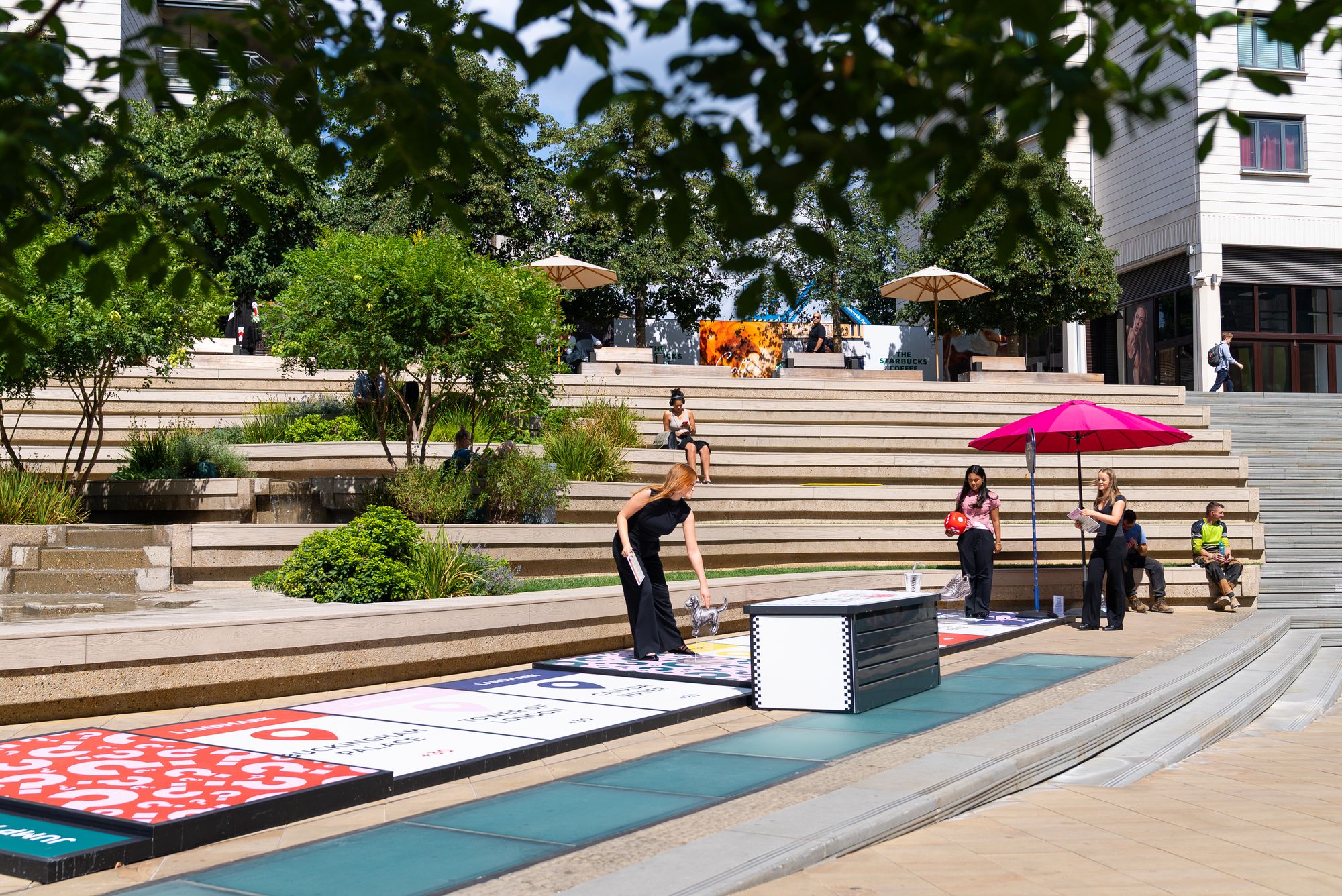 The Lifesize London board laid out beside the steps of The Amphitheatre at Paddington Central.